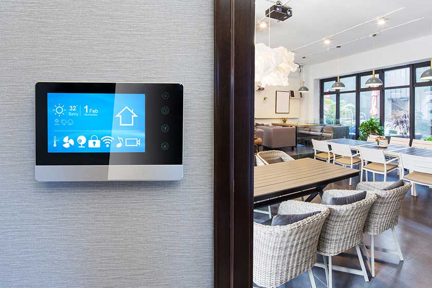 Smart home app in control panel in modern restaurant